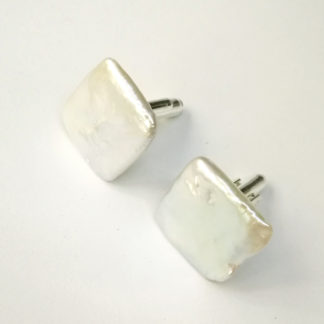 Silvery cufflinks with lustrous white and grey square nucleated freshwater pearls